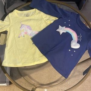 Two long sleeve shirts.